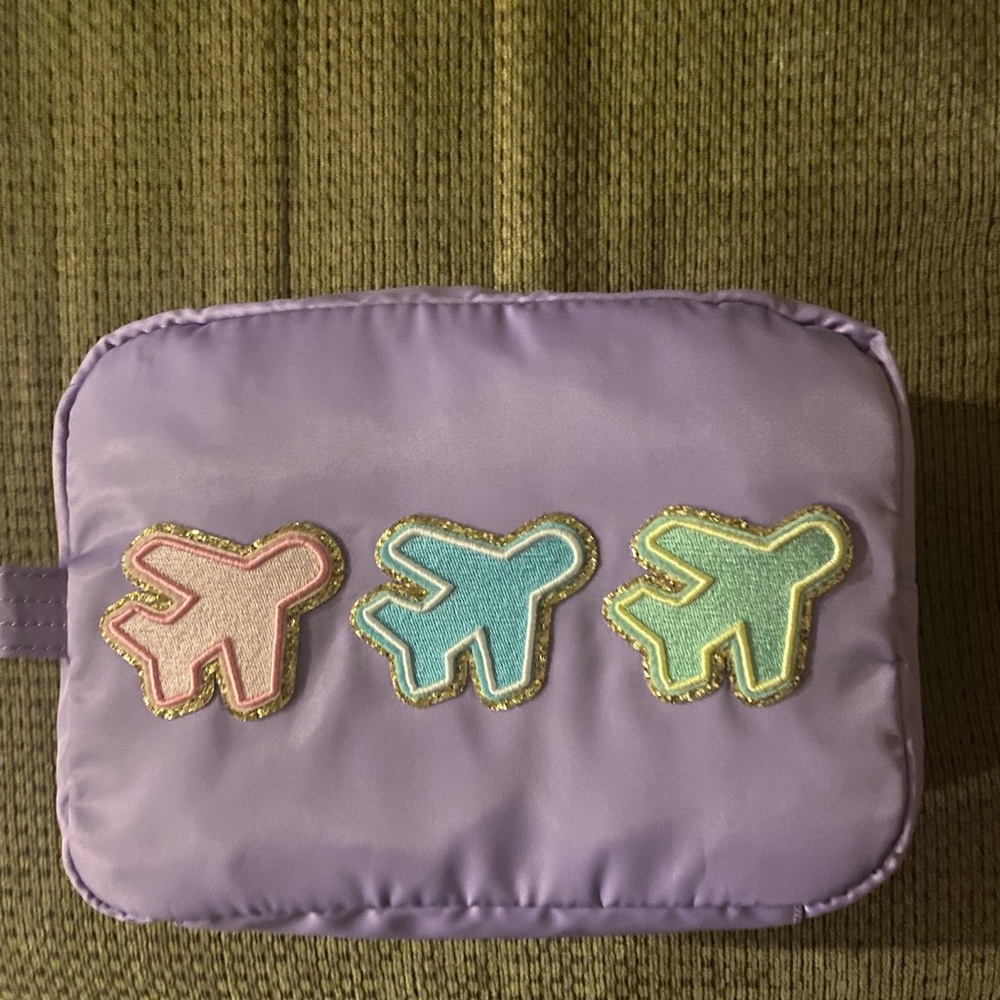 Stoney clover x target airplane pouch